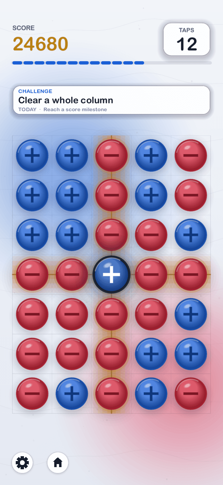 A full row and column lit up around a tapped charge, about to clear ten charges at once